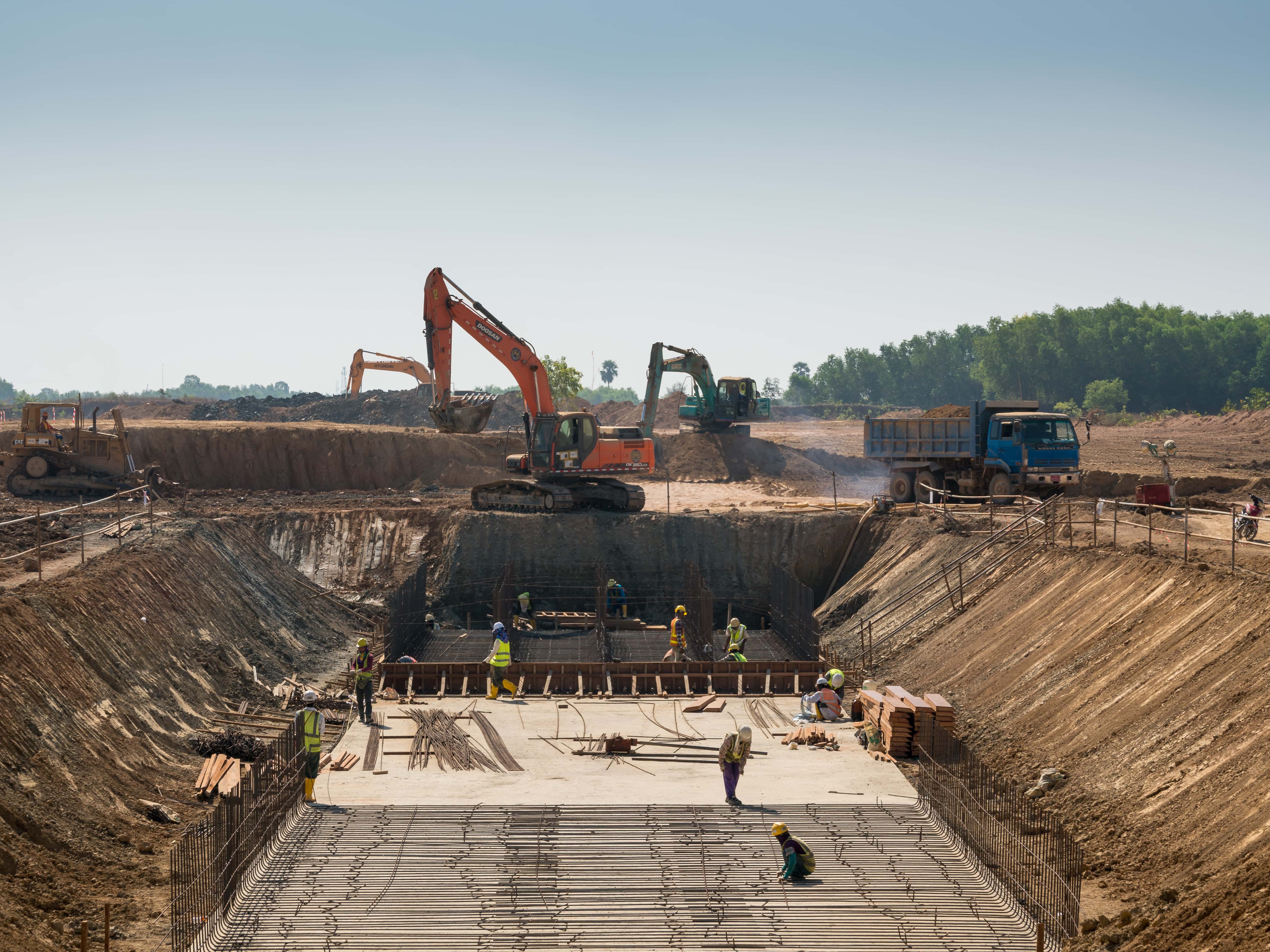 A civil construction site with heavy machinery in operation. - Jerone Toledo Frente